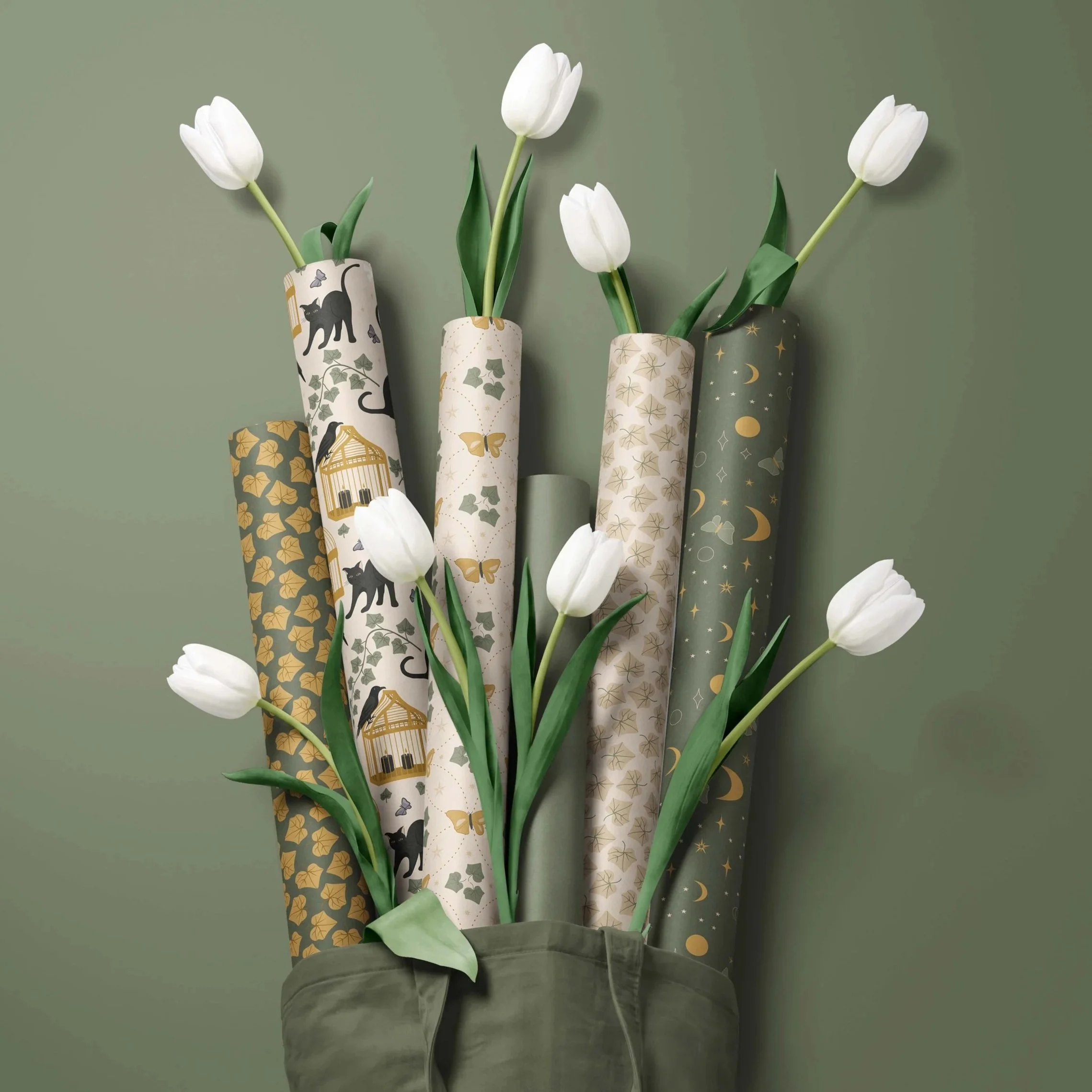 Gift wrap collection featuring coordinated wrapping paper designs from The Midnight Society surface pattern collection.