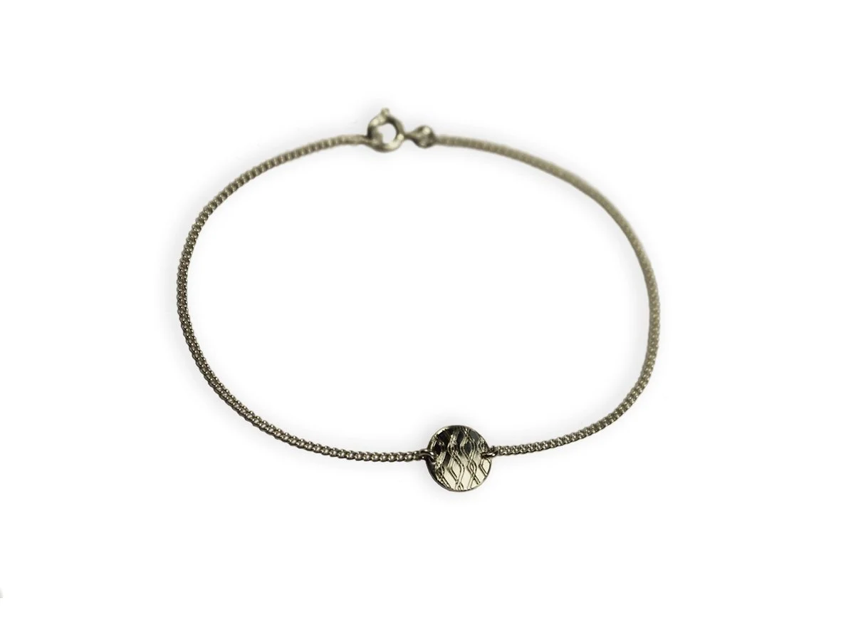 Armband_rundKLAG.jpg