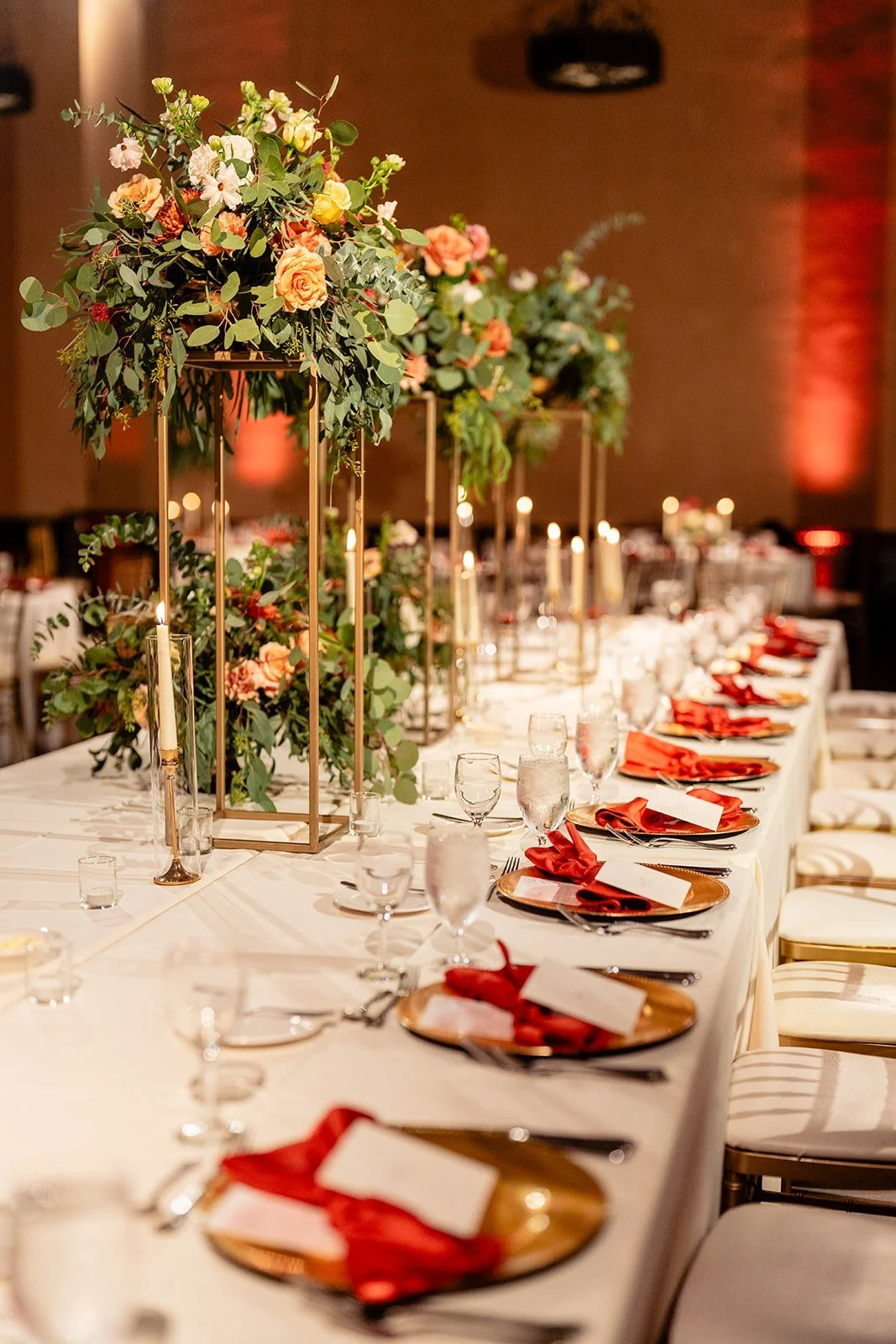 wedding-floral-arrangements-gold-stand-banquet-table.jpg