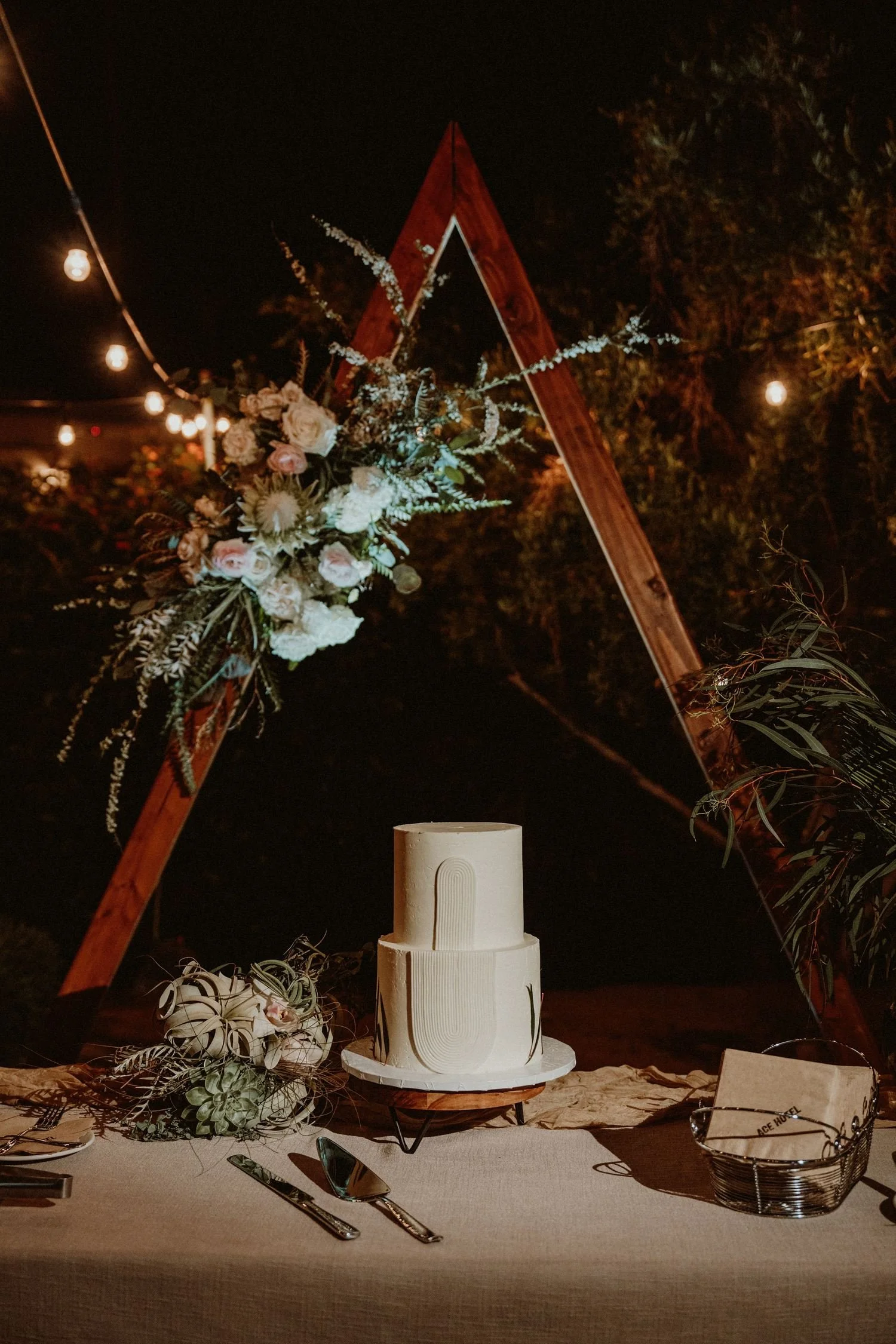 san-diego-wedding-cake-triangle-arch-florals.jpg