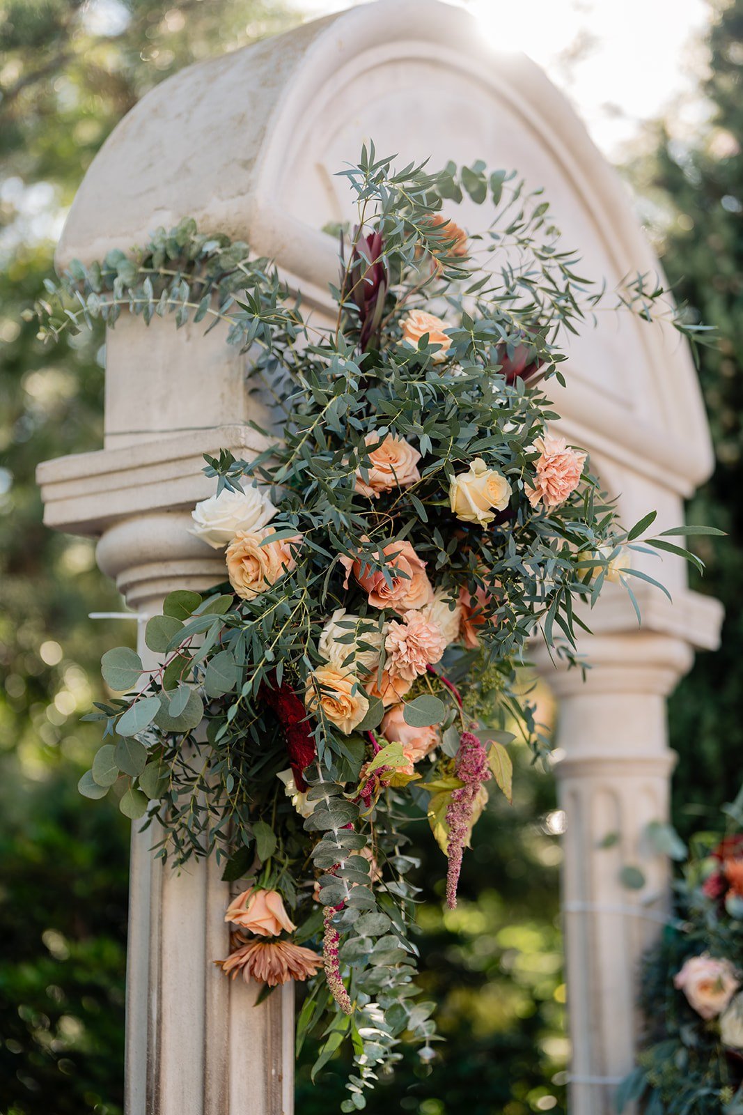 san-diego-wedding-arch-floral-spray-peach-roses.jpg
