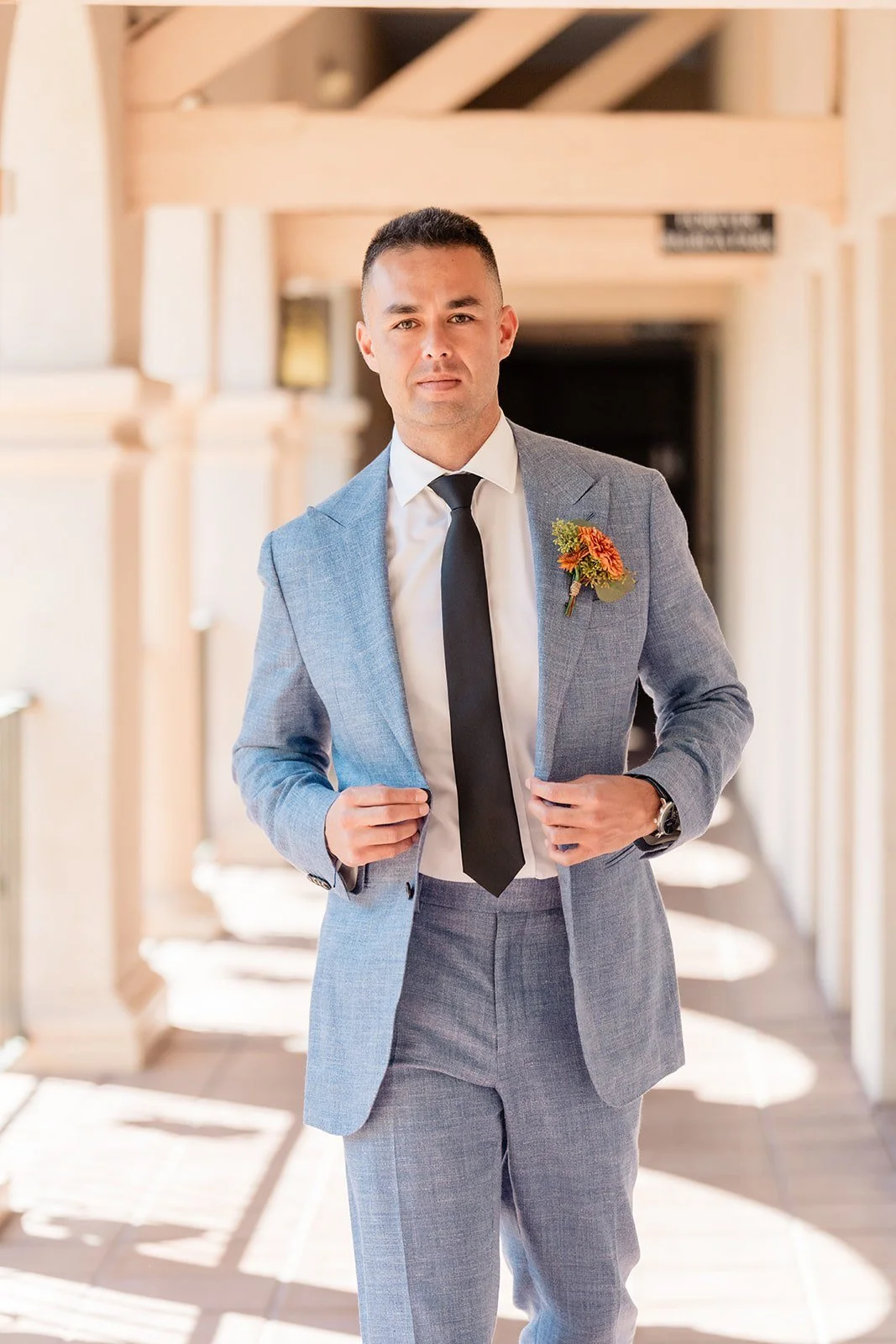 san-diego-groom-boutonniere-orange-dahlia-suit.jpg