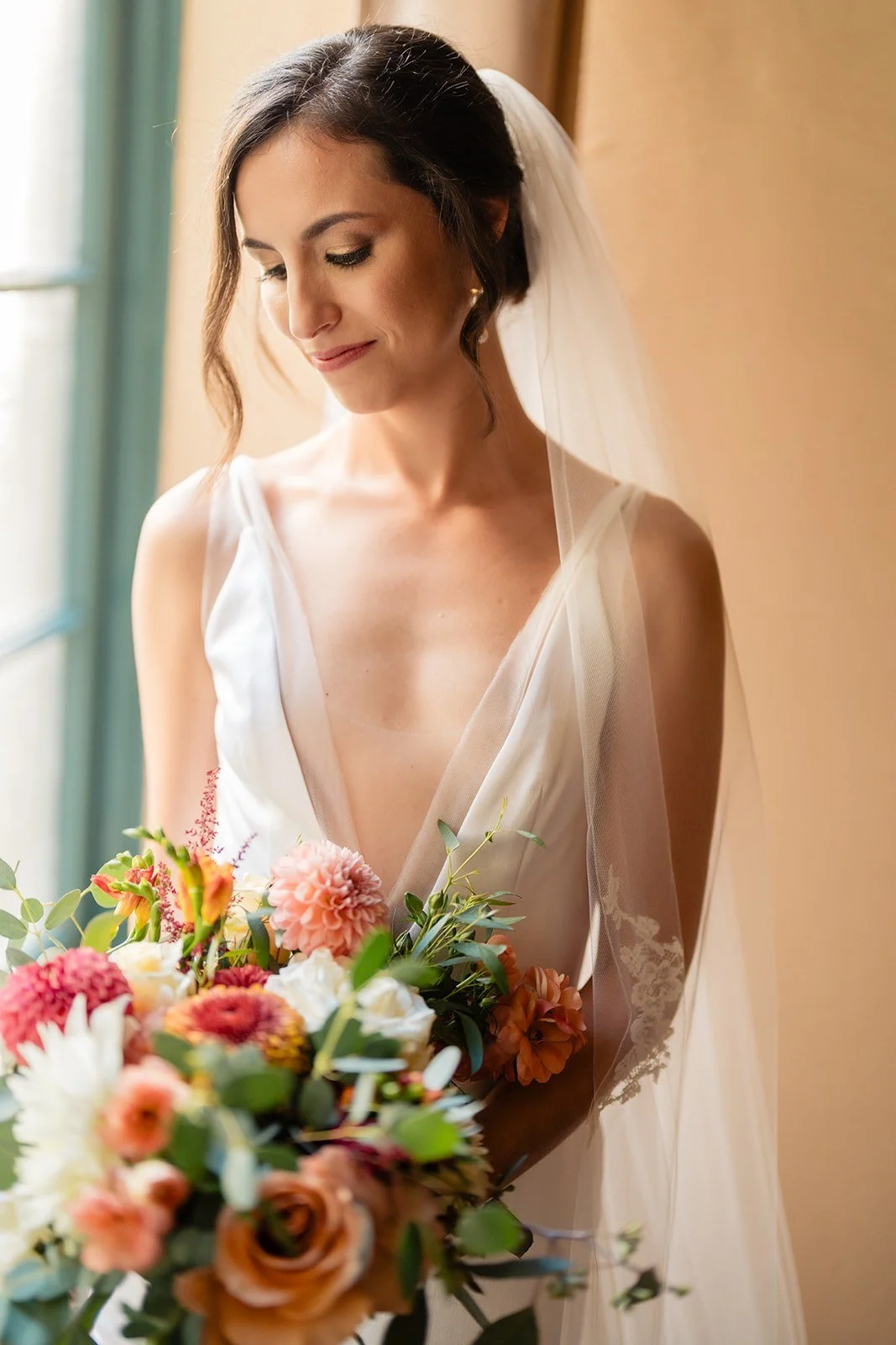 wedding-flowers-san-diego-bride-veil-bouquet-window.jpg