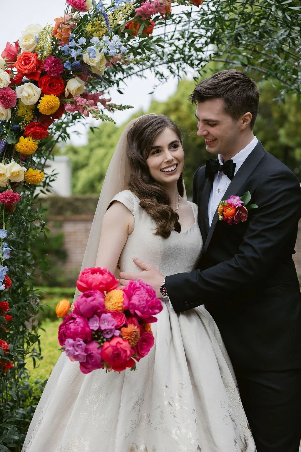 san-diego-wedding-ceremony-arch-colorful-florals.jpg