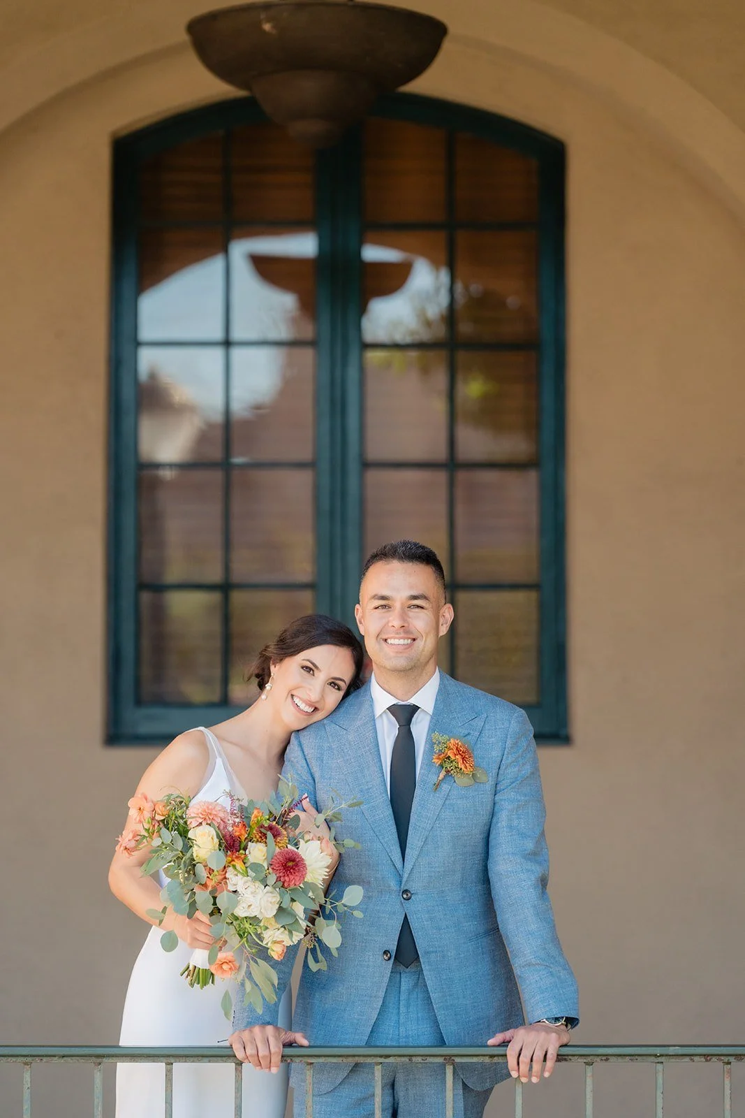 san-diego-wedding-florist-couple-balcony-bouquet.jpg
