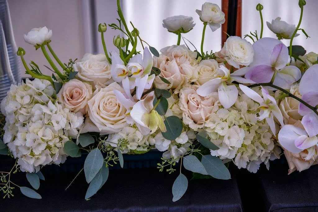 wedding-head-table-floral-garland-roses-orchids.jpg