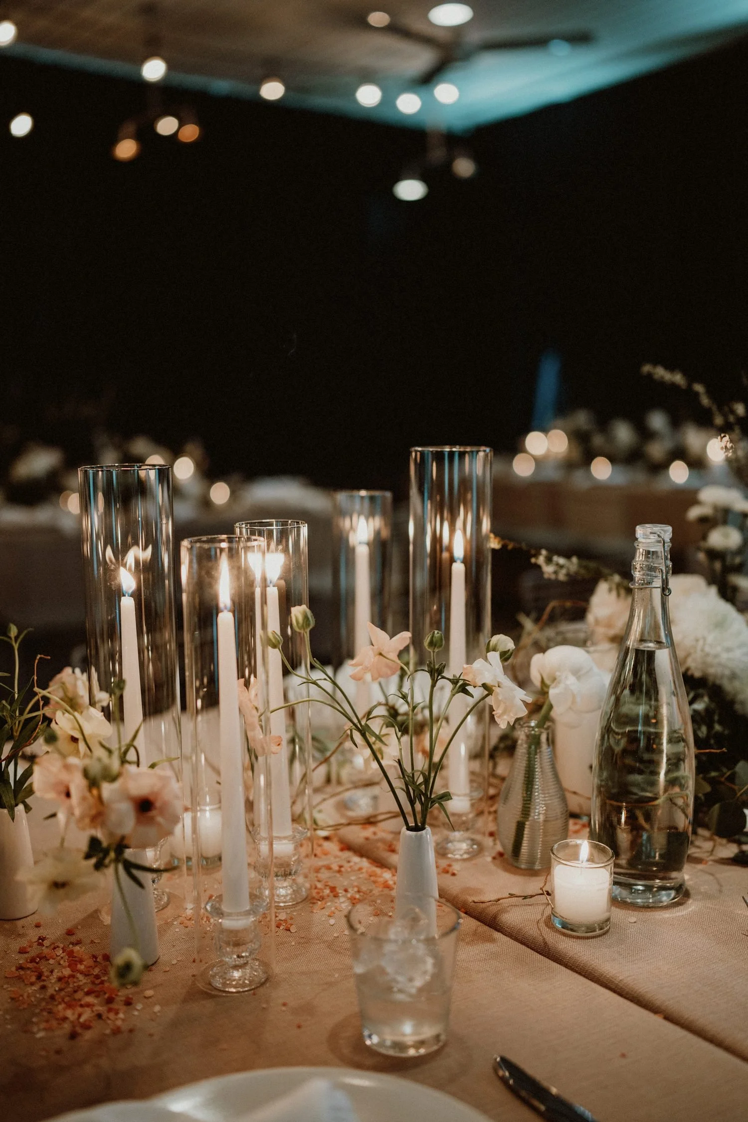 wedding-reception-white-floral-bud-vases-candlelight.jpg