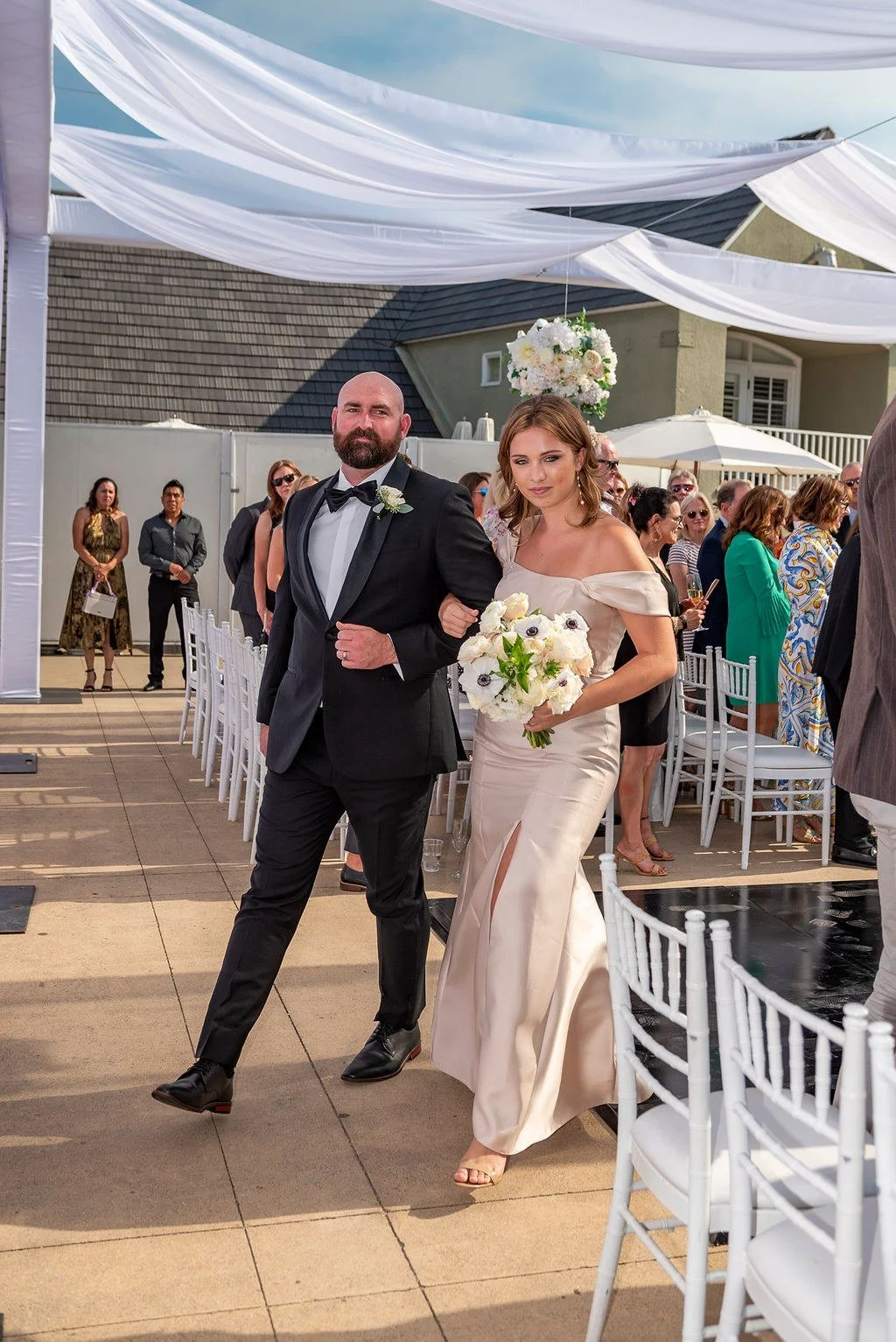 wedding-florist-bridesmaid-anemone-bouquet-aisle.jpg