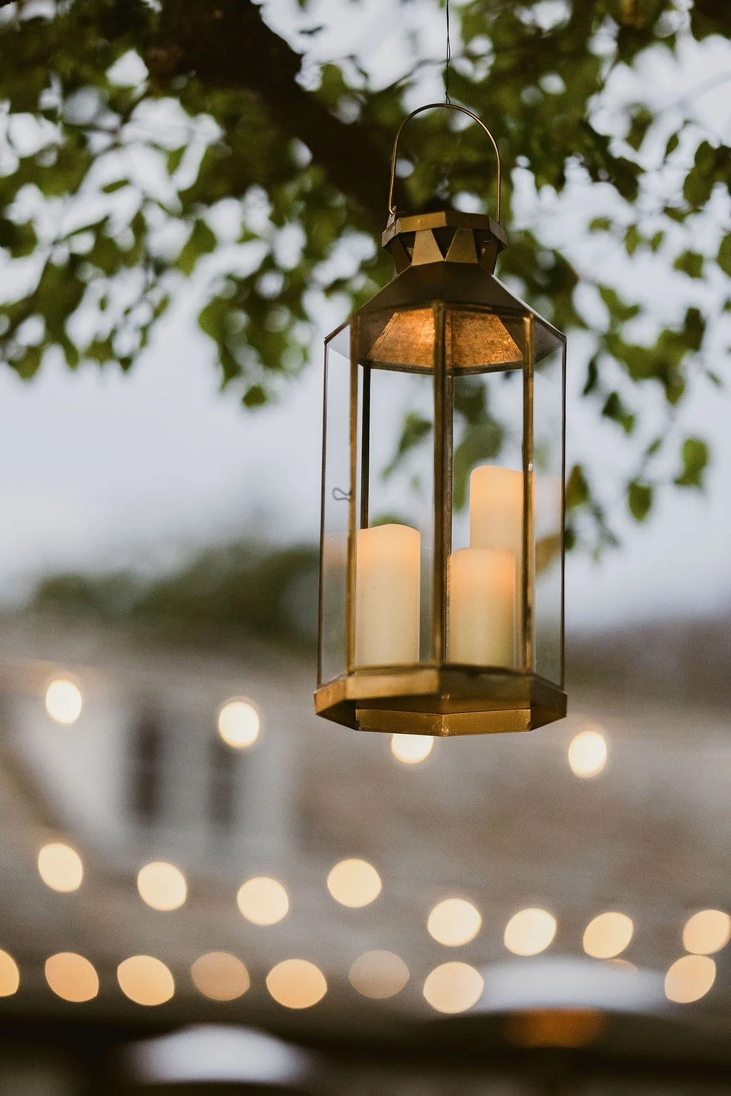 wedding-event-gold-lantern-string-lights-outdoor.jpg