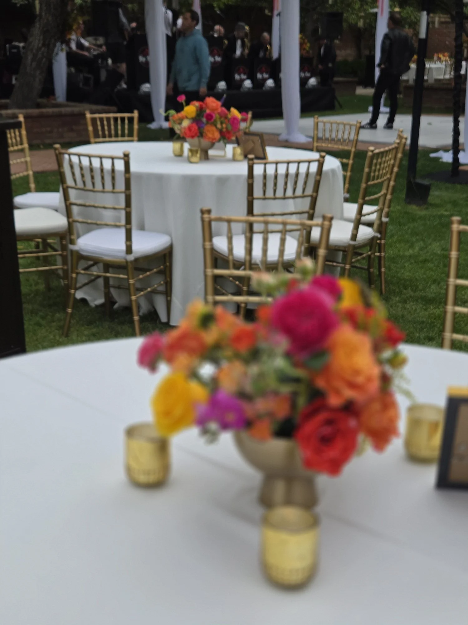 wedding-reception-tropical-floral-centerpiece-gold-stand.jpg