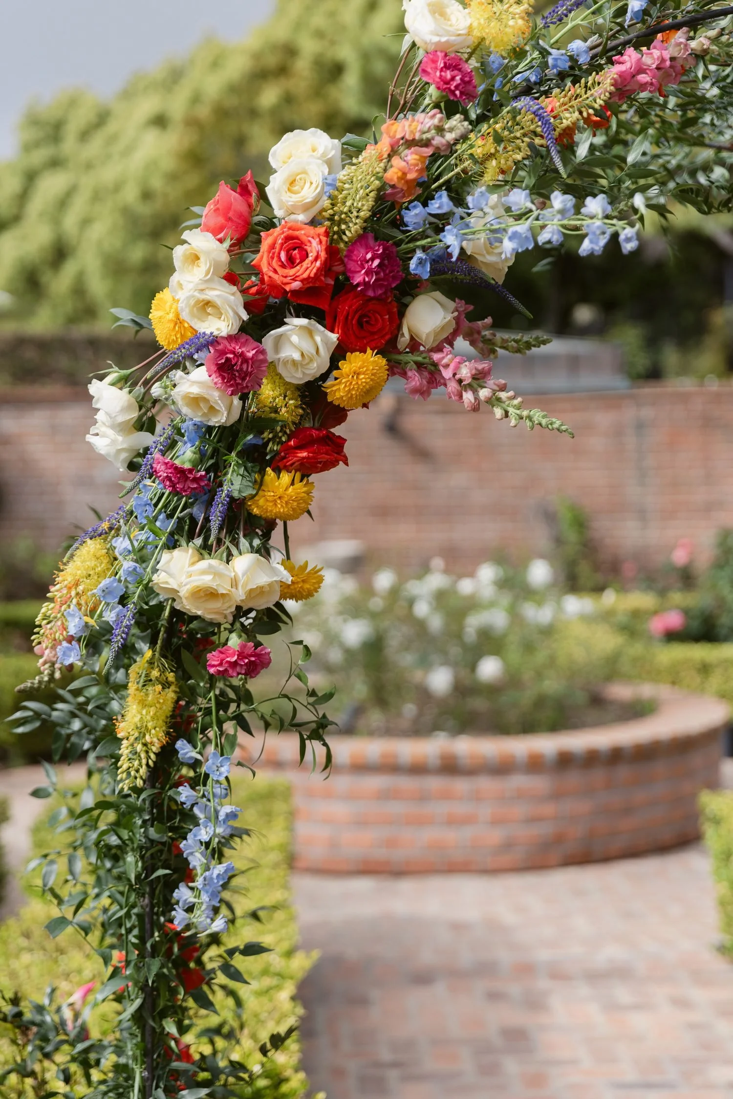san-diego-wedding-ceremony-arch-colorful-roses-detail.jpg