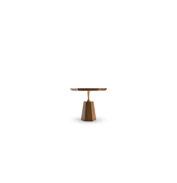 A small wooden table with a round top, a gold-colored support, and a blocky wooden base, isolated on a white background.