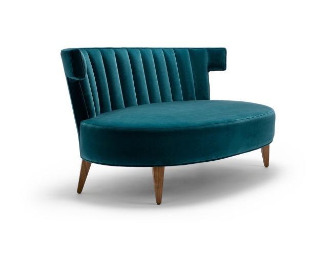 A teal velvet upholstered sofa with vertical channel-tufted backrest and wooden tapered legs.