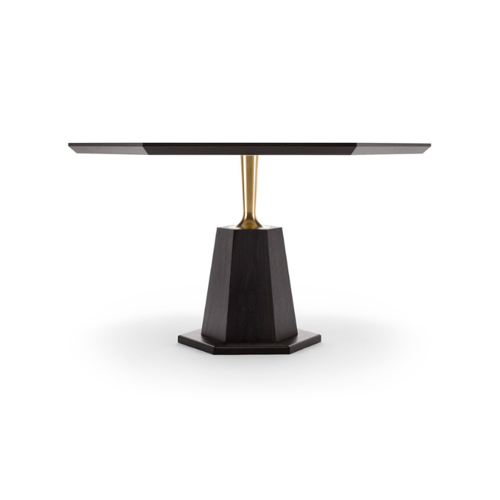 A modern black dining table with a wooden base and a brass accent connecting the top and the base, isolated on a white background.
