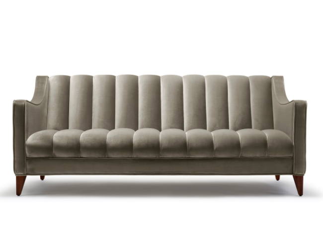 Gray upholstered sofa with wooden legs and a modern design.