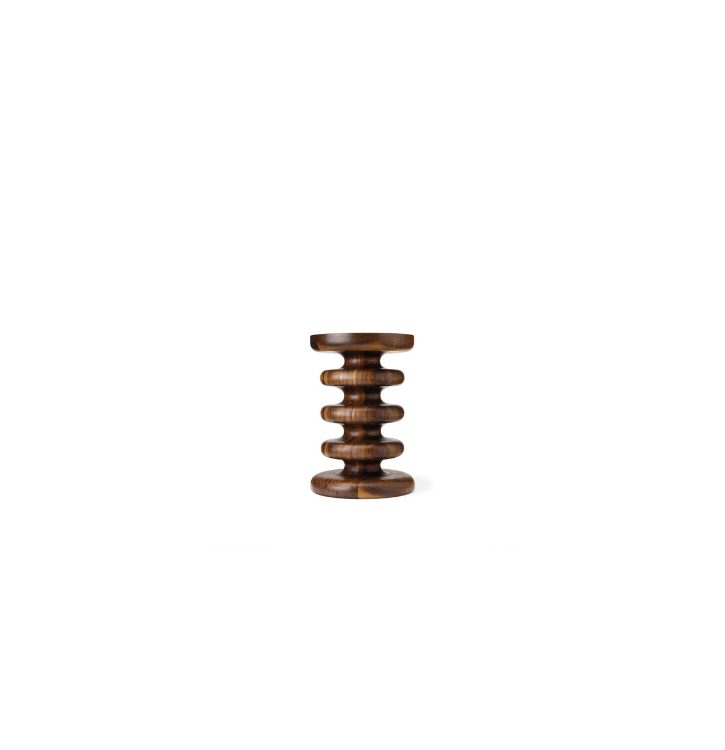 A wooden stool with a unique, multi-layered, spiral design against a plain white background.