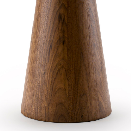 Close-up of a wooden table leg with a conical shape and natural wood grain.