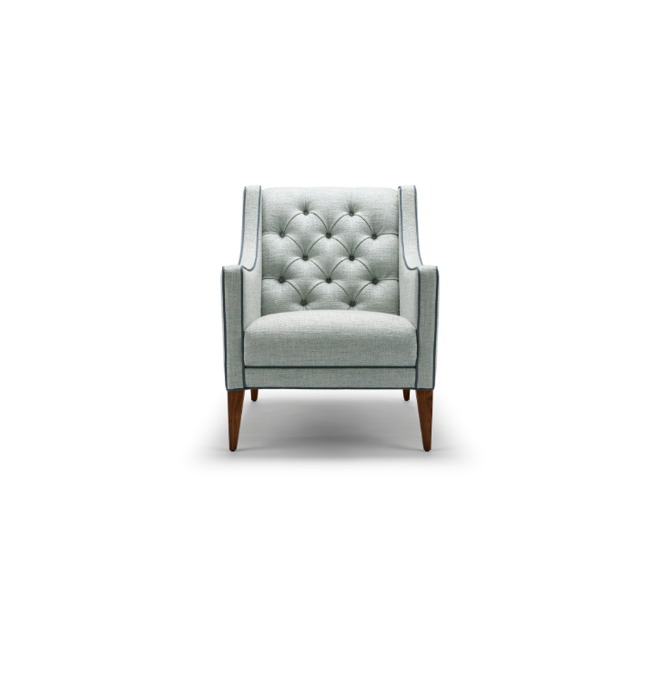A light gray upholstered armchair with a tufted backrest and wooden legs, centered on a white background.