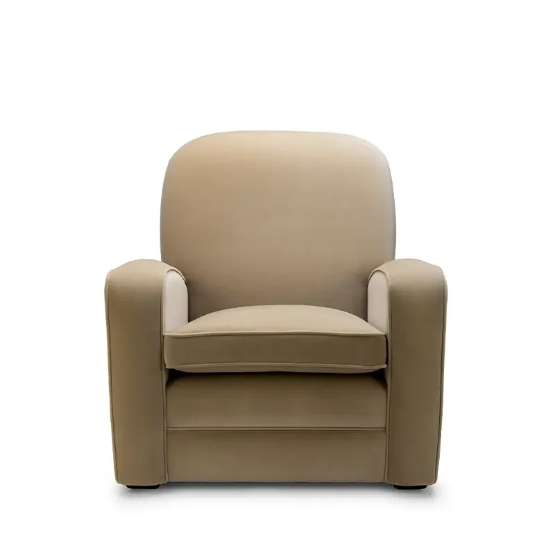 Beige upholstered armchair with cushioned seat and backrest, and rounded armrests, on a white background.