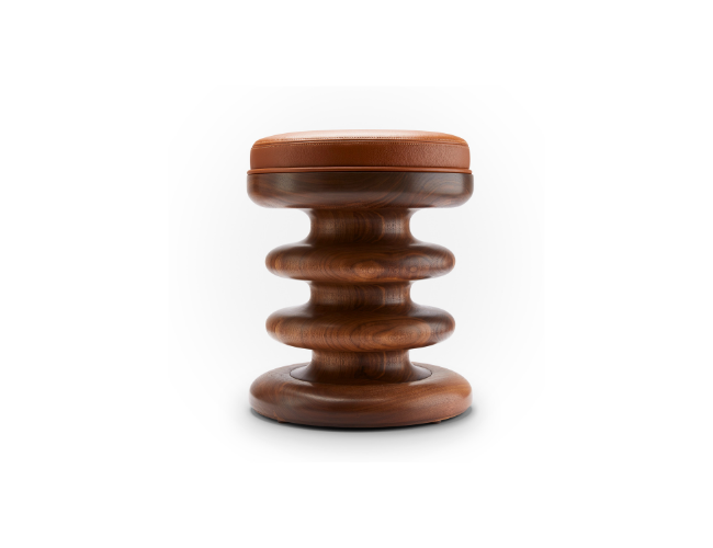 A wooden stool with a cushioned top.