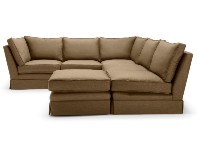 Brown sectional sofa with a matching ottoman against a white background.