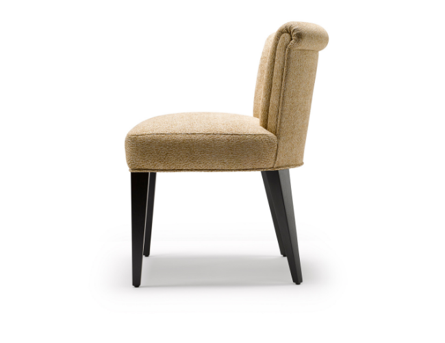 Beige upholstered chair with dark wooden legs and a tall, slightly curved backrest.