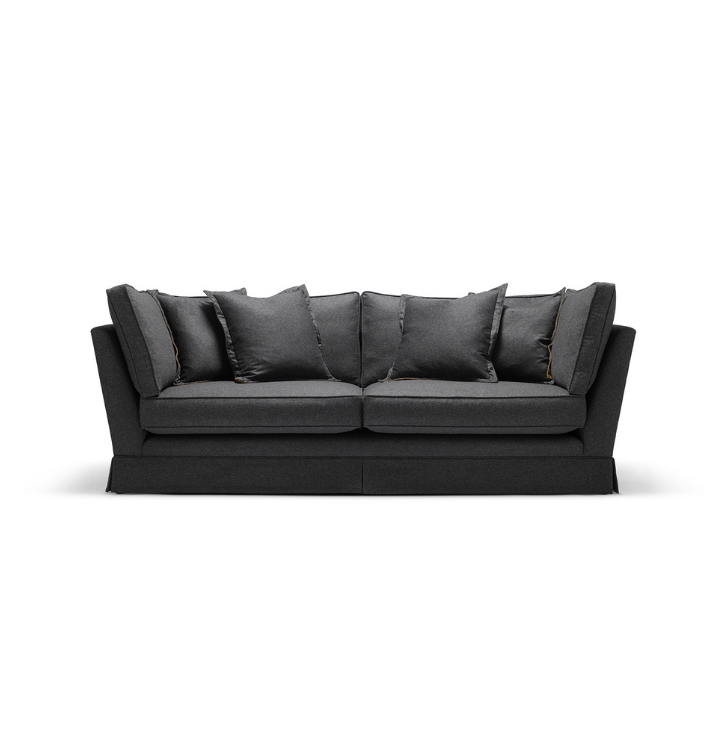 Grey sofa with multiple cushions on a white background.