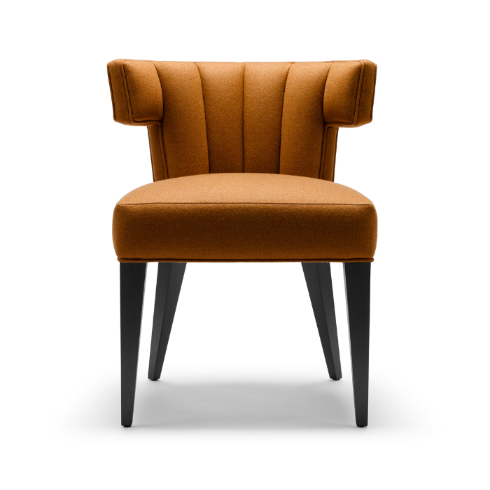 Brown upholstered accent chair with a modern design and black wooden legs.