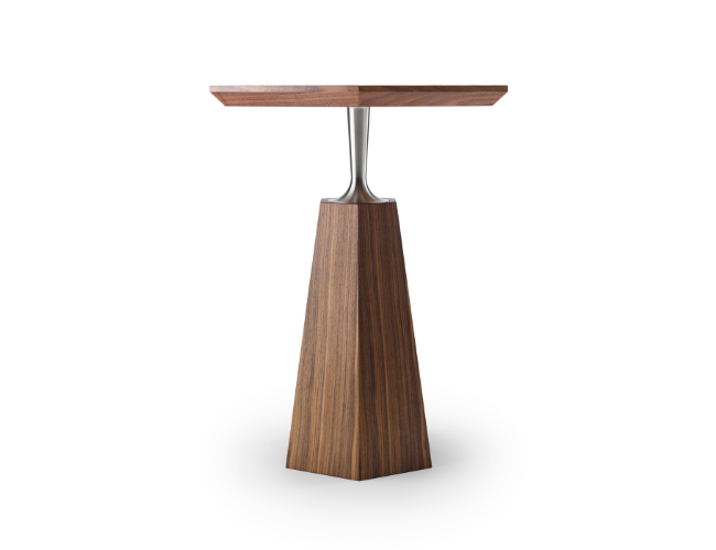 Wooden side table with a tapered base and a round tabletop.