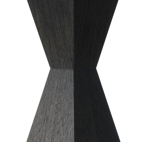 Abstract black and gray geometric shape with symmetrical lines and angles.