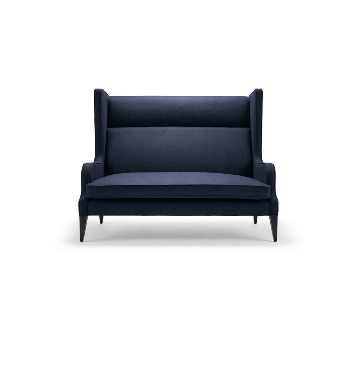 Dark blue high-back armchair with winged sides on a white background.