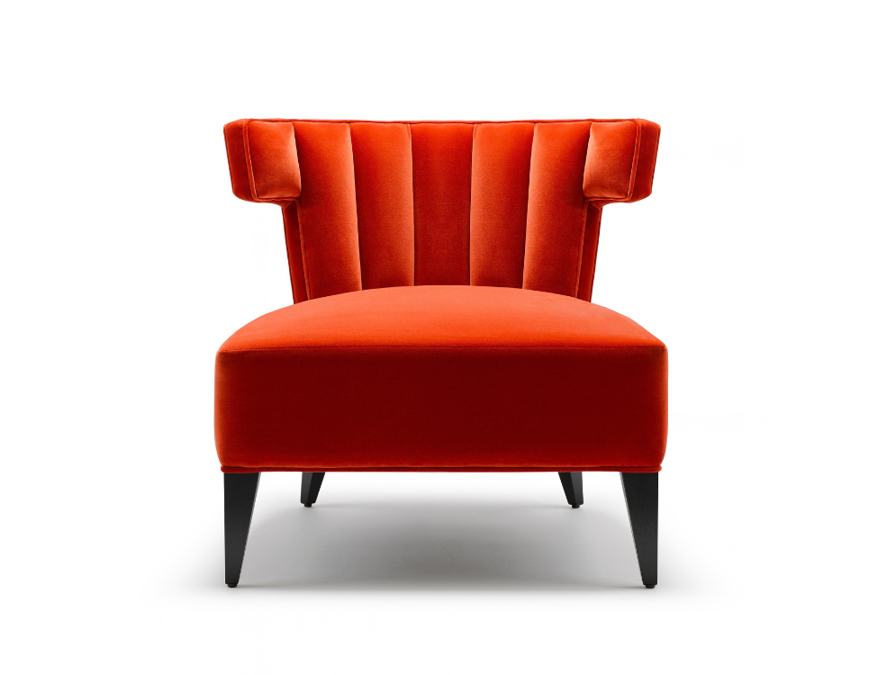 Red upholstered armchair with a high back and black wooden legs on a white background.