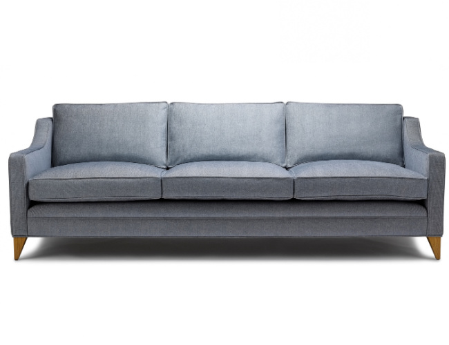 Gray fabric sofa with wooden legs against a white background.