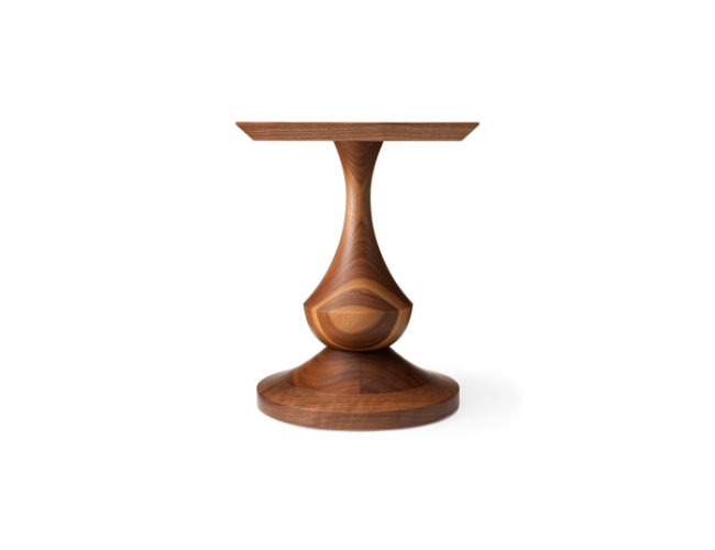 Wooden pedestal table with a smooth, curved base on a white background.