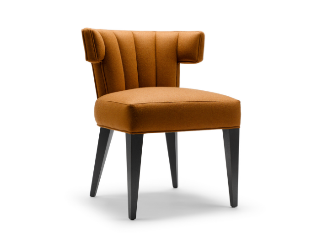 A stylish orange upholstered chair with a wingback design and black wooden legs, set against a white background.