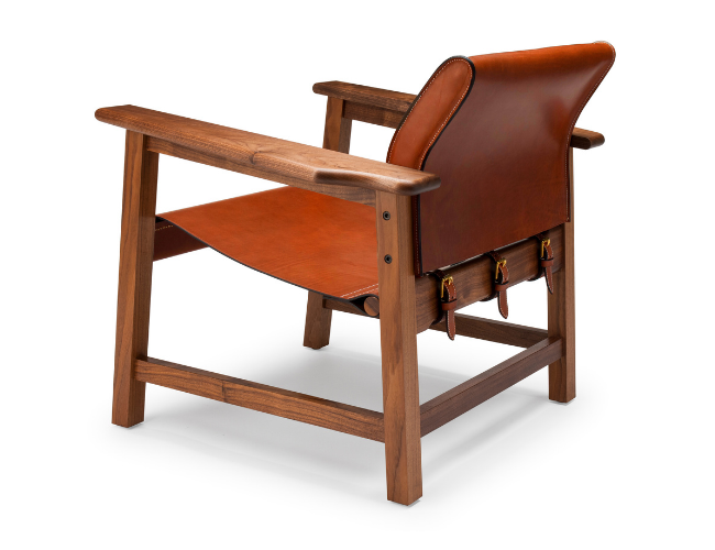The Saddle Up Chair shown from the back angeld with tan leather.