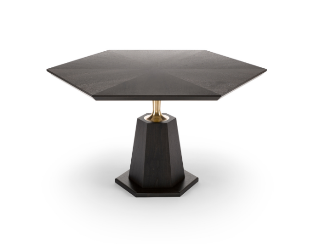 A black hexagonal table with a gold accent on the pedestal, set against a white background.