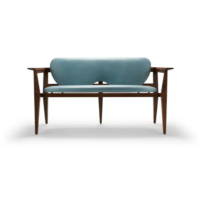 A modern wooden bench with teal upholstered cushions on a white background.
