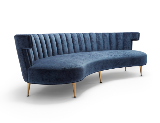 Blue velvet upholstered vintage-style sofa with wooden tapered legs and vertical channel tufting.