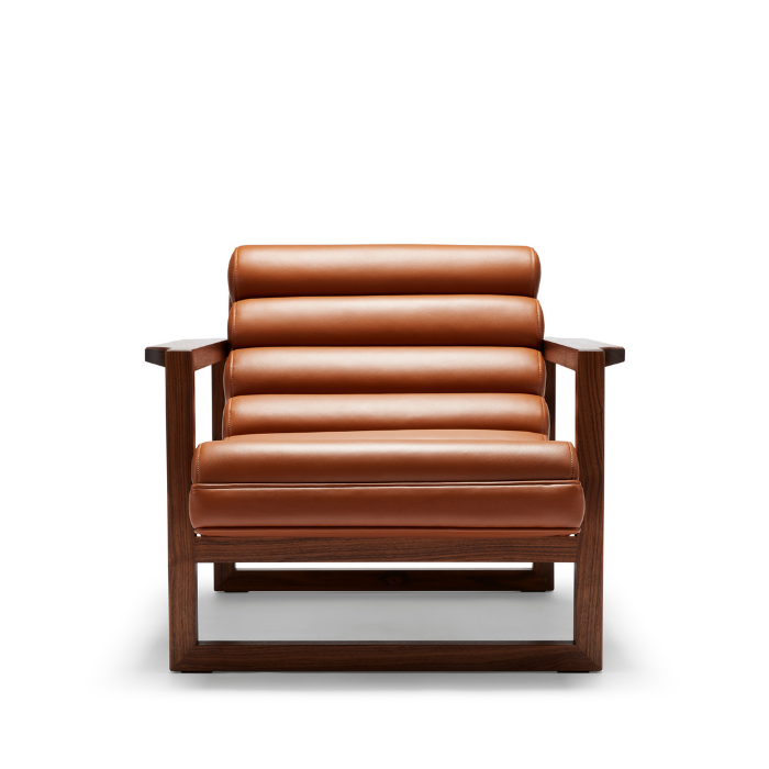 A modern armchair with a wooden frame and brown leather cushions.