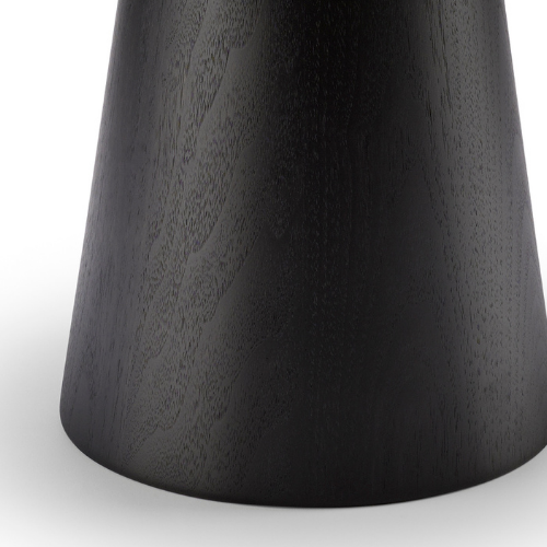 Close-up of a black, textured wooden cylindrical object.