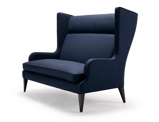 A modern navy blue high-back armchair with sleek black legs and curved armrests.