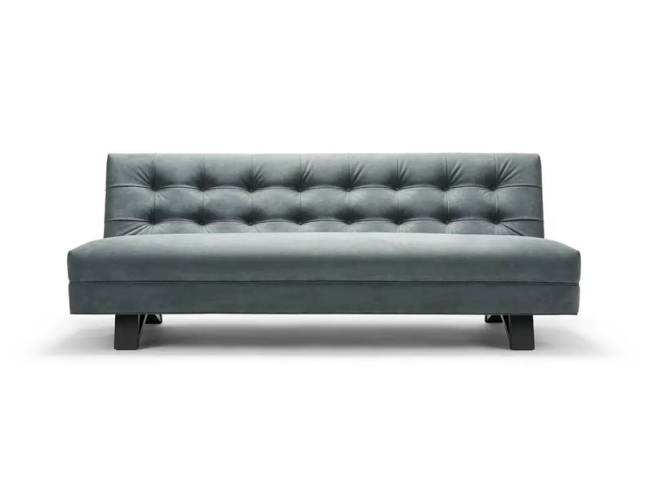 Gray upholstered sofa with tufted backrest on a white background.
