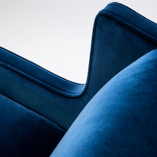 The Alae Lounge by Stuart Scott Furniture. Close up showing the piping on the chair.