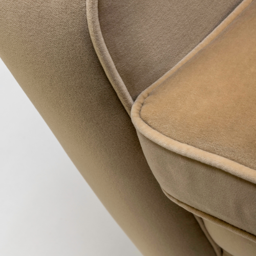 The Henri Armchair by Stuart Scott Furniture. Close up showing the piping on the chair.