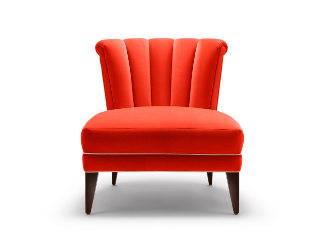 Isabella Occasional Chair shown here with black legs and upholstered in Dedar Piment cotton velvet. View from front.