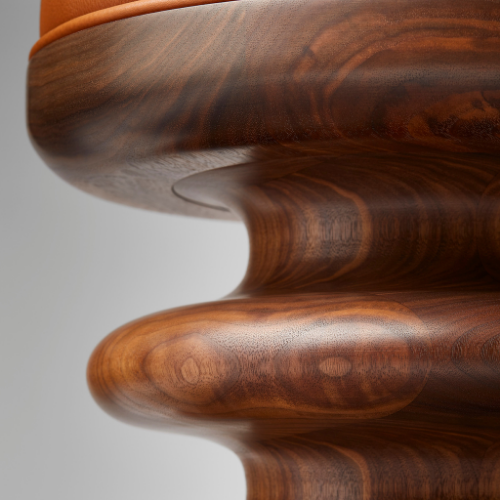 Close-up of a polished wooden table with a smooth, rounded edge.