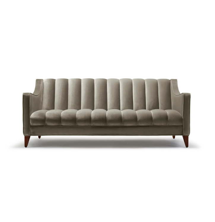 Gray upholstered tufted sofa with wooden legs