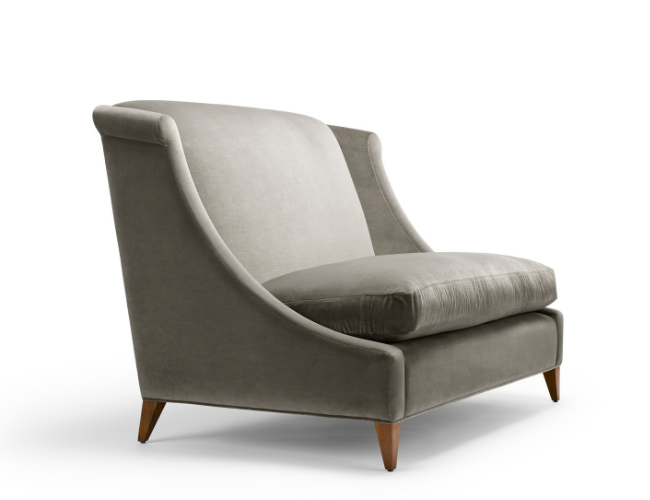 Gray upholstered armchair with wooden legs and curved backrest.