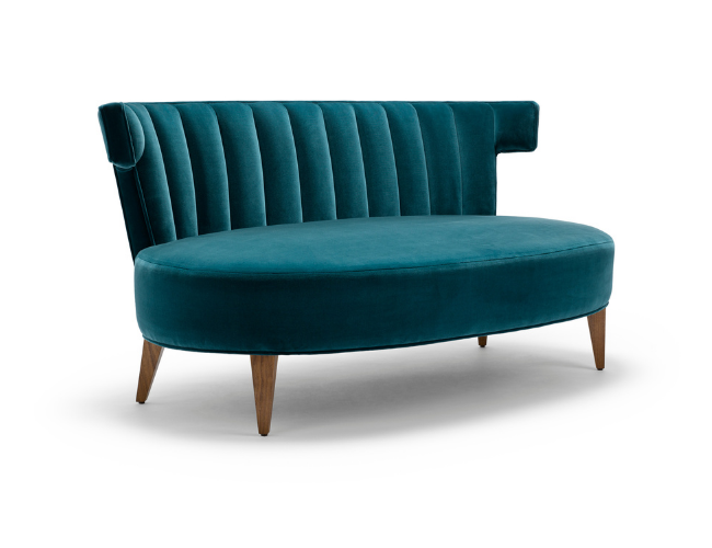 Teal velvet sofa with wooden legs and vertical tufted backrest